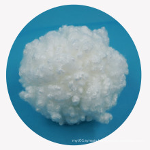 Siliconized solid polyester staple fiber